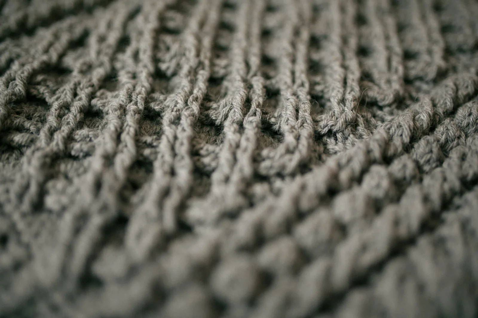 Close view of knitted fabric showing its stitch density